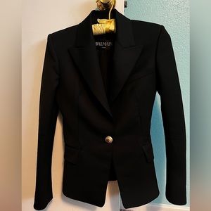 Balmain single breasted virgin wool blazer.